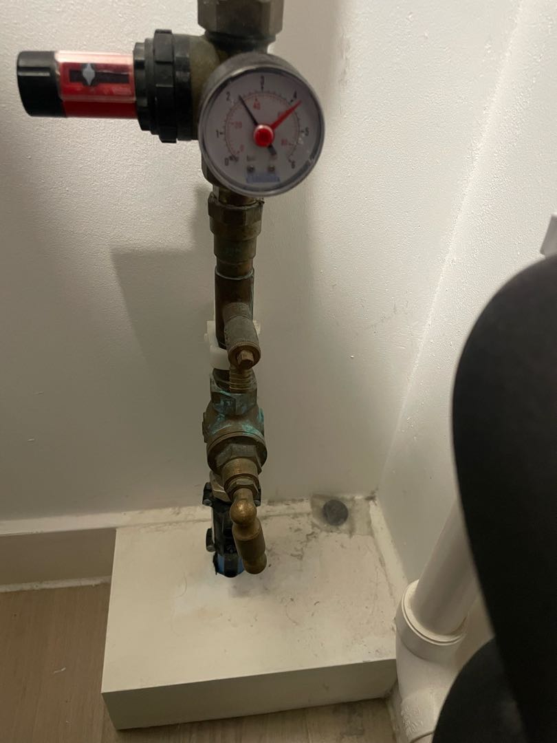 Pressure-test gauge connected to the water supply